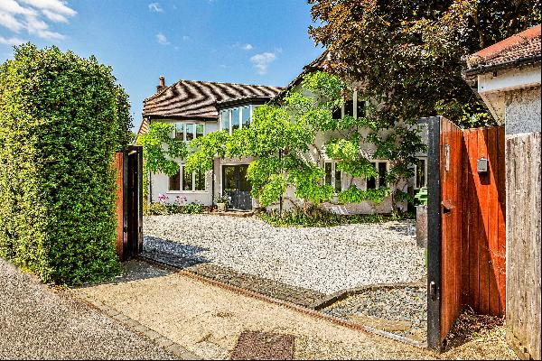A wonderful family home, set in a private and secluded plot, situated just off the Petersh