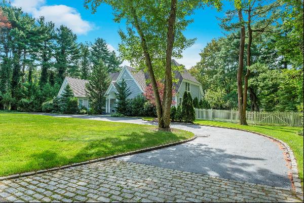 OLD WESTBURY. Standing majestically on well over two magnificent, country club acres, this