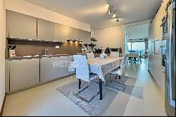 Lugano-Origlio: elegant duplex penthouse apartment with roof terrace & open view of natur