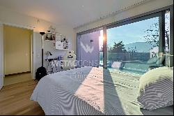 Lugano-Origlio: elegant duplex penthouse apartment with roof terrace & open view of natur