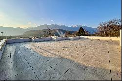 Lugano-Origlio: elegant duplex penthouse apartment with roof terrace & open view of natur