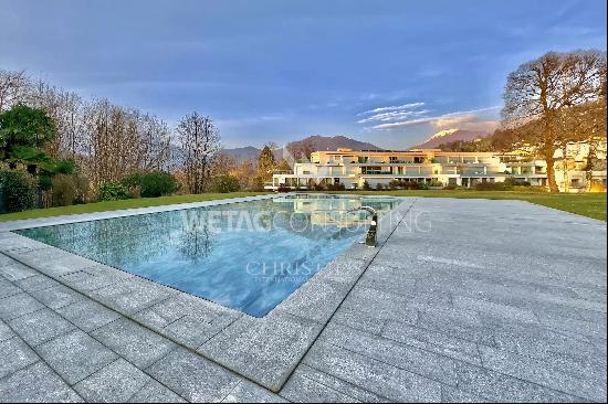 Lugano-Origlio: elegant duplex penthouse apartment with roof terrace & open view of natur