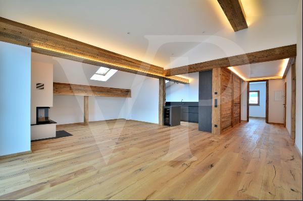 High quality attic apartment in a sunny location