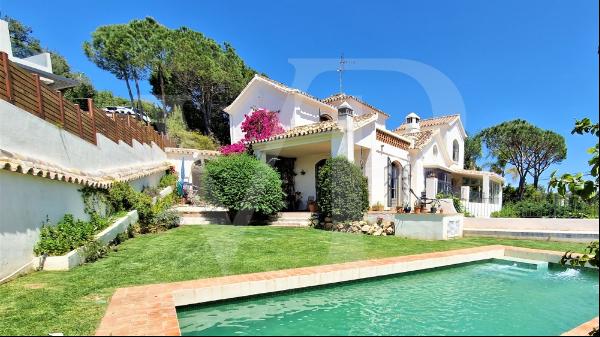 enchanting villa with sea views in a gated community.
