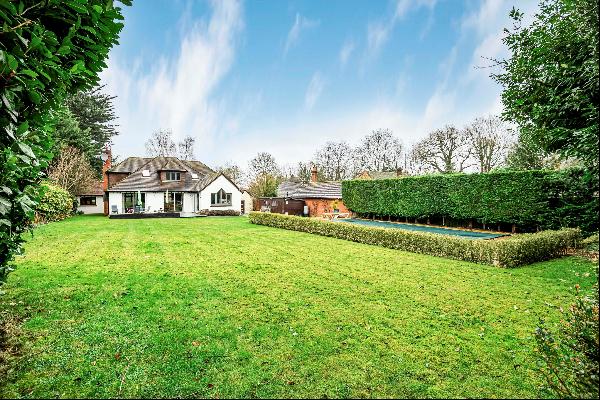 A superb contemporary detached house with lovely grounds.