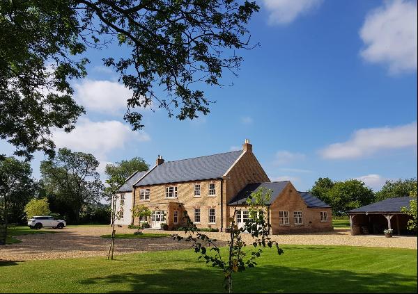 A stunning individually designed recently built detached house with adjoining annexe, larg