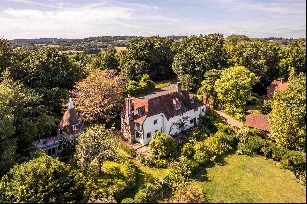 A wonderful Grade II listed house with a detached one bedroom oast house and unconverted s