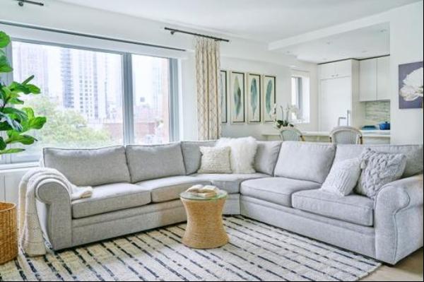 Welcome home to this tasteful and stylish 1,145sf one bedroom, 1.5 bath apartment featurin