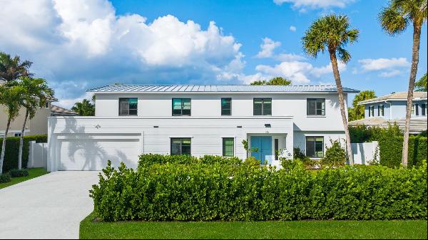 Enjoy the beauty of this renovated coastal residence in the sought-after Jupiter Inlet Col