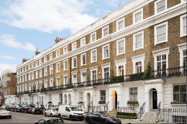 A charming Grade II listed period townhouse with fine proportions and elegant architectura