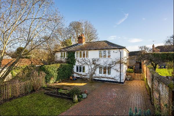 A beautiful designed three double bedroom cottage with parking and detached studio