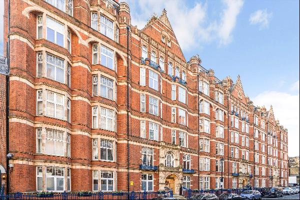A spacious apartment on the third floor of a portered red brick mansion block in the heart