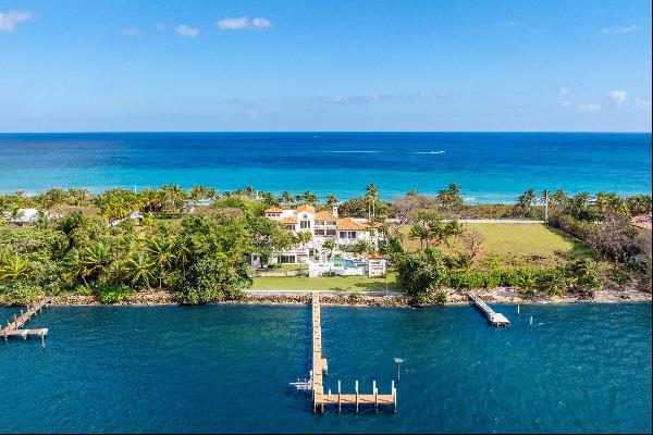 Recently updated, this stunning Ocean-to-Intracoastal Manalapan compound with beach house 