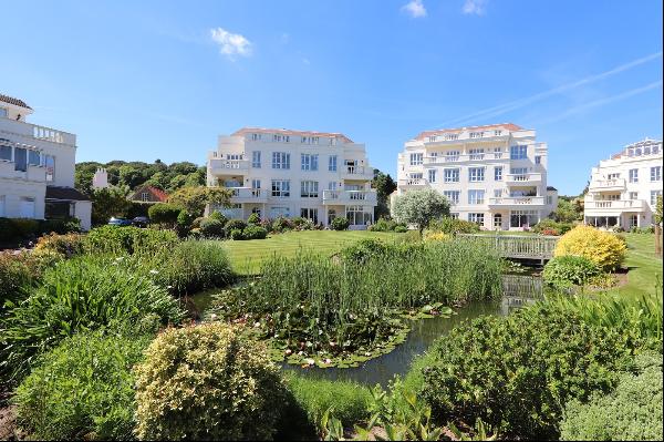 Outstanding garden apartment in prestigious development