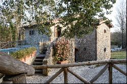 An Antico Mulino nestled in a forest of holm oaks near Arezzo