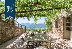 Panoramic 11th-century luxury villa for sale in Tuscany, on Lucca's hills