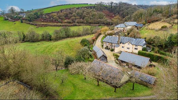 A charming 16th century farmhouse in a lovely country setting with annexe, outbuildings an