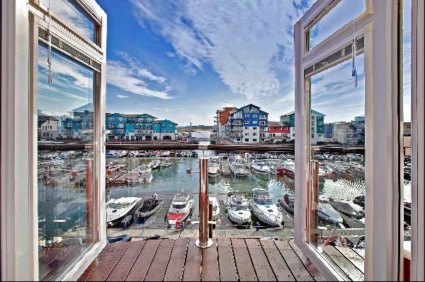 A stunning waterside property with four bedrooms, on exclusive Exmouth Marina.