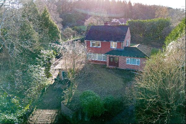 An exceptional opportunity to acquire a detached three/four bedroom family home with the p