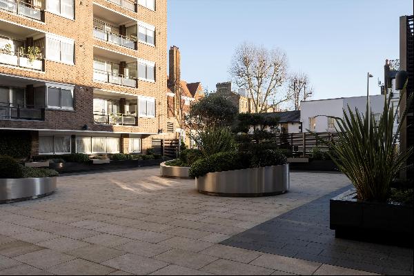 A 3 bedroom apartment for sale with a private garden in Kensington Heights, W8.