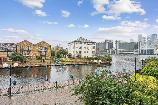 A bright two bedroom maisonette with picturesque waterside views and a west facing garden,