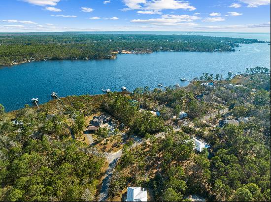 Serene Waterfront Living On More Than One Acre