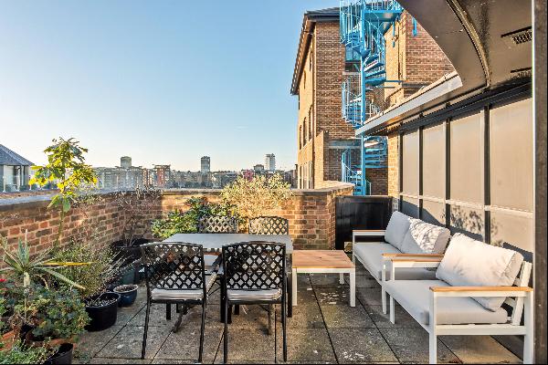 A duplex penthouse on the top two floors of Tower bridge Wharf, with an impressive terrace