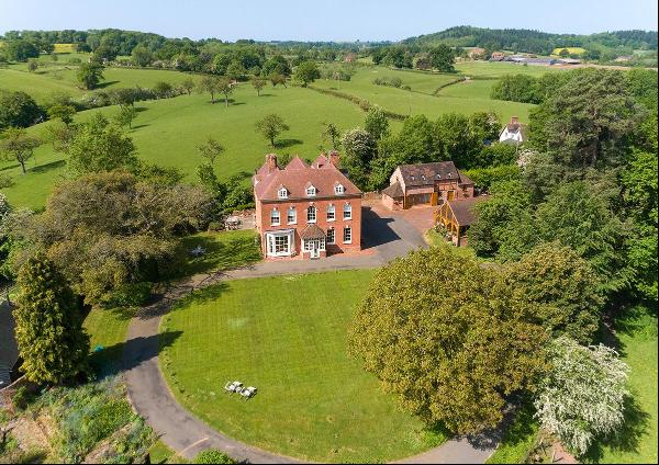 An immaculately maintained Grade II Listed house in a beautiful rural setting.