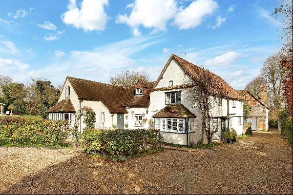 A lovely Grade II Listed cottage in wonderful gardens and grounds, benefitting from a good