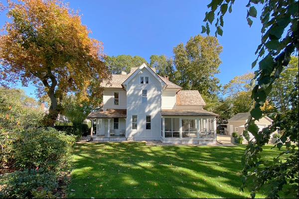 Newly renovated 1882 Gothic Victorian on .5 acres, featuring deep eaves and a roof compose