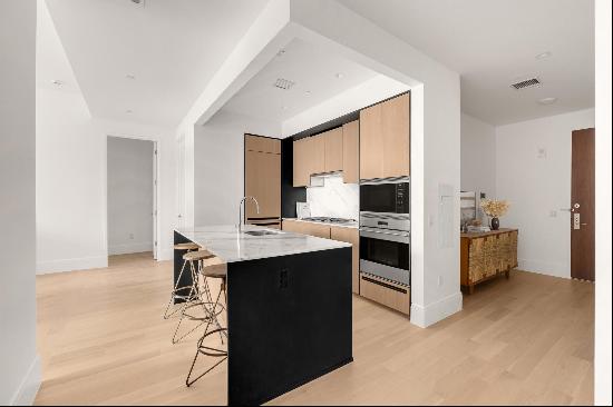 IMMEDIATE OCCUPANCY.Residence 7H offers a radiant 2-bedroom, 2.5-bath home with 