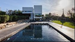Contemporary 4-bedroom villa with sea views for sale in Estói, Algarve