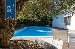 Luxury villa with a pool in the Camilluccia private residential complex for sale in Rome