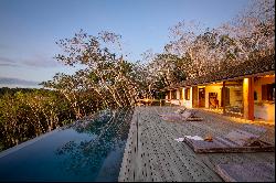 Newly-built house at the edge of the valley, surrounded by the Atlantic Forest