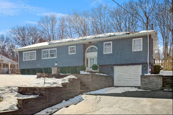 Welcome to 70 Ridge Rd W, located in the charming community of Sag Harbor. Situated at an 