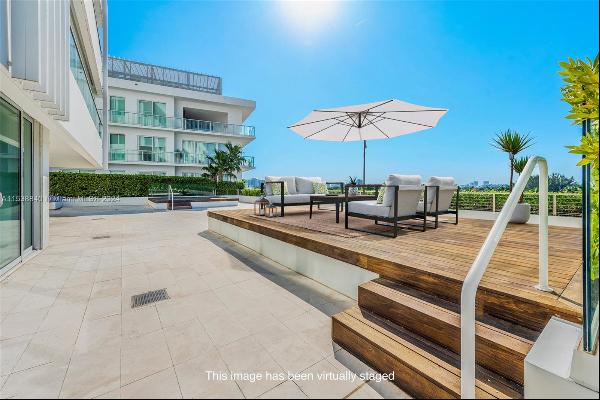 Enjoy this ONE OF A KIND RESIDENCE with 2,000+ SF of private outdoor terrace space at The 