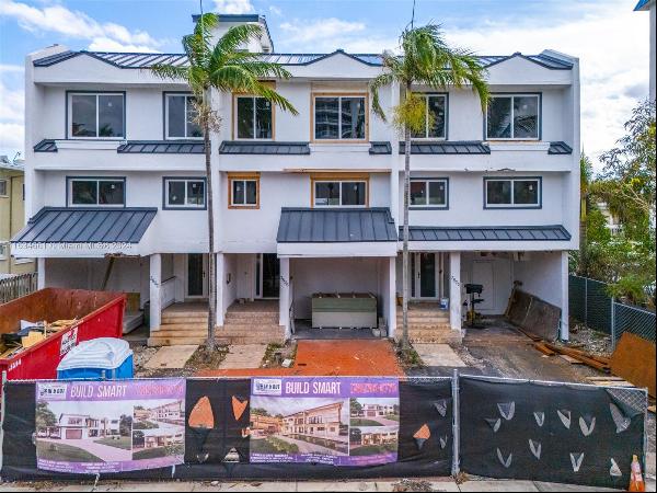 Incredible opportunity to finish building out 3 side by side townhouses in the exclusive E