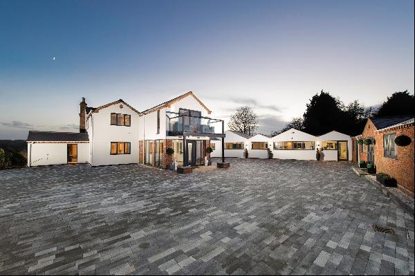 A superb property with a contemporary layout with separate apartment, indoor pool and barn