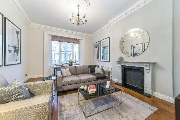 A well-presented two bedroom Grade II listed apartment with a terrace for sale on Queen's 