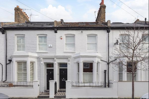 Welcome to this impressive family home situated on Broughton Road, SW6.