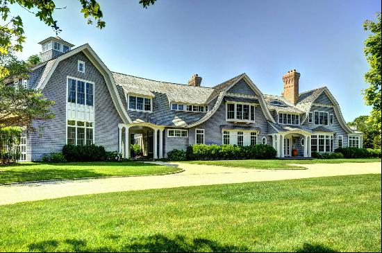 Gorgeous two-story, 9,000 +/- square foot Gambrel sited on 2.5 +/- beautifully landscaped 