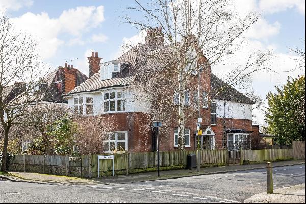 An impressive double fronted Edwardian house set on a substantial plot overlooking Wandswo