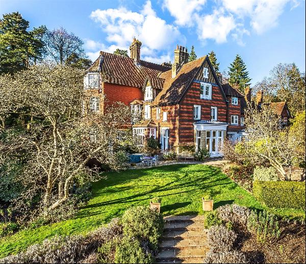 A substantial wing of a fine country house with exceptional views to the south yet within 