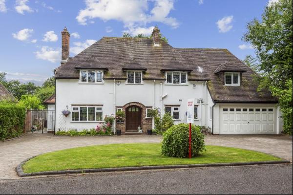 Situated on the highly sought-after Moor Hall Drive and backing onto Moor Hall Golf Club t