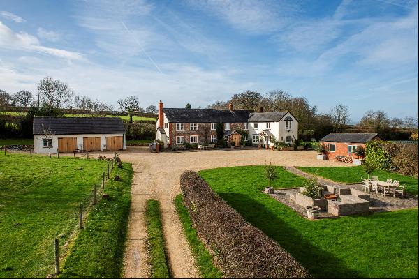 A beautifully refurbished period farmhouse set in 4 acres in a private setting with views 