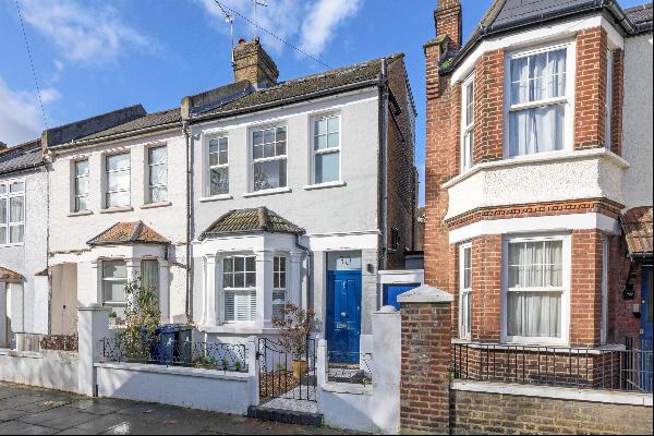 A three bedroom, end of terrace freehold house close to South Acton