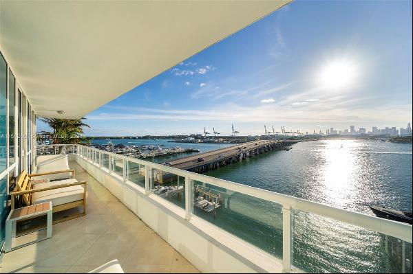 Enjoy breathtaking views of Biscayne Bay and the Miami skyline from this ready-to-move-in 