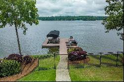 Exquisite Lakefront Property with Beautifully Landscaped Grounds