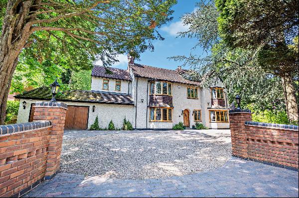 A handsome five bedroom Edwardian family home sat in 0.48 acres with a gym, sauna, heated 