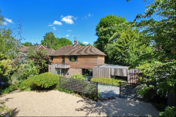 A contemporary, detached 5 bed family house for sale located in a leafy and sought-after l